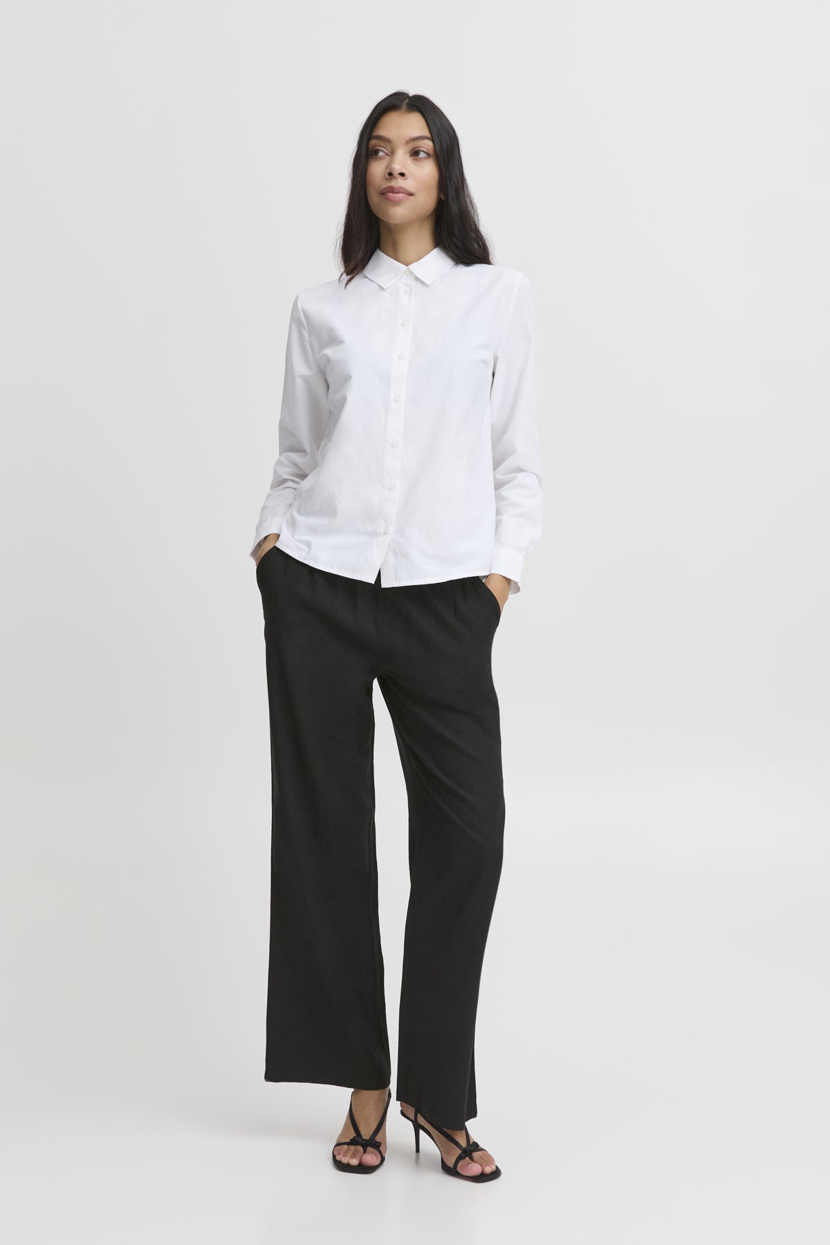 B. young Black Falakka Long Trousers