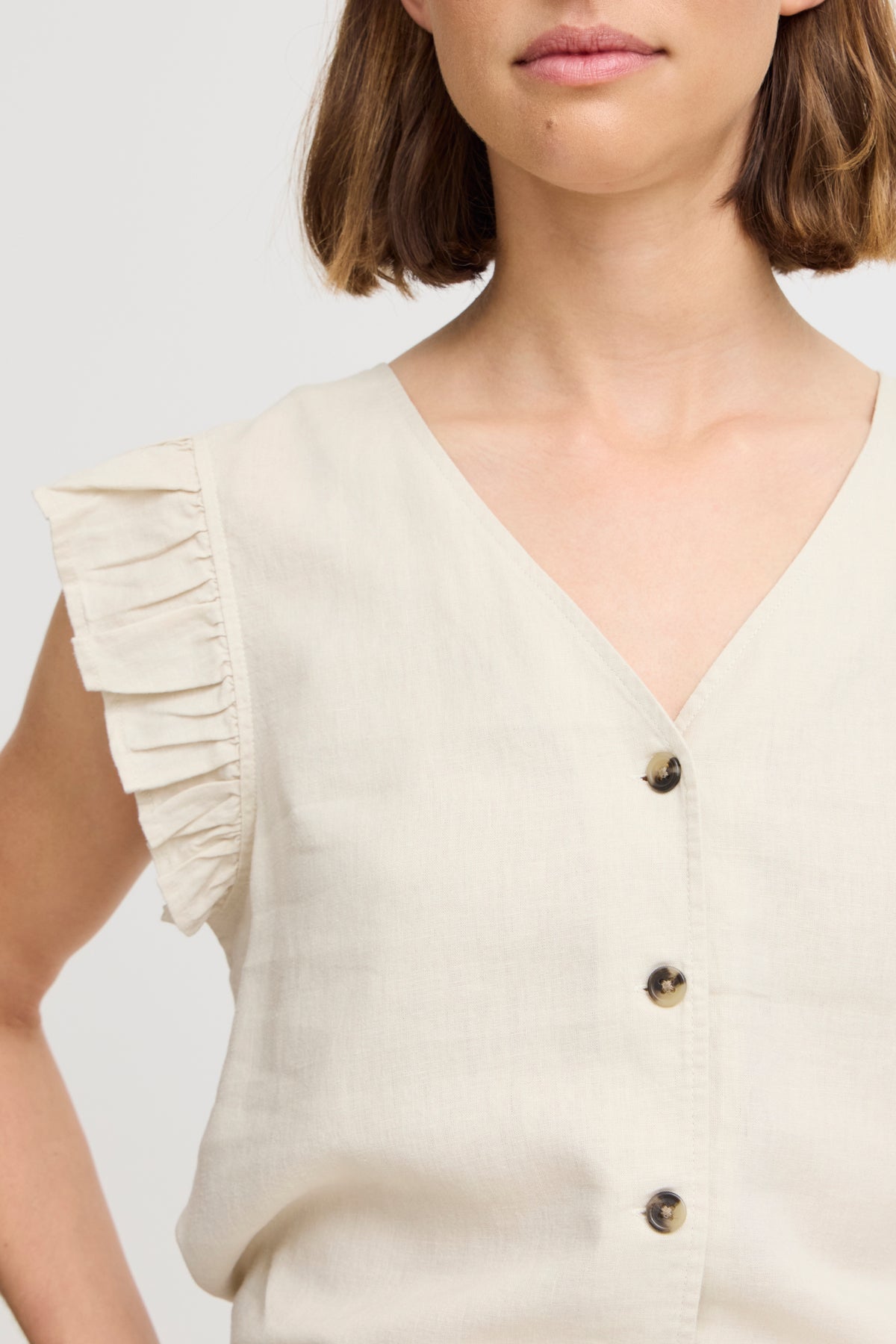 B. young Cream Falakka Ruffle Shirt