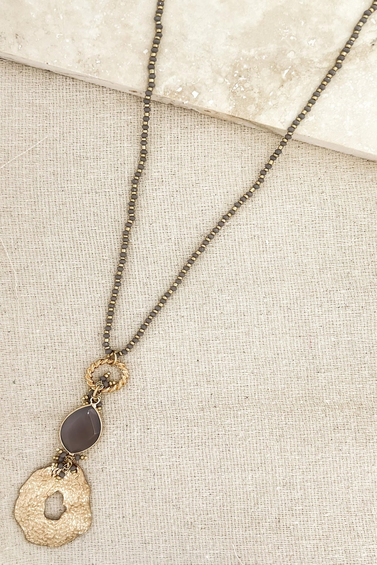 Envy Battered Gold and Purple Stone Pendant Necklace