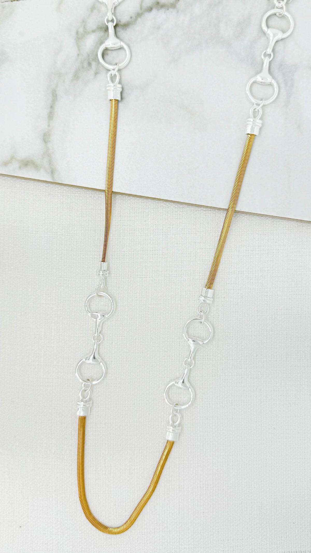 Envy Long gold snake chain necklace with silver soft bit design